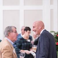 Two guests talking with each other.